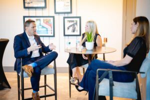 three development employees talking